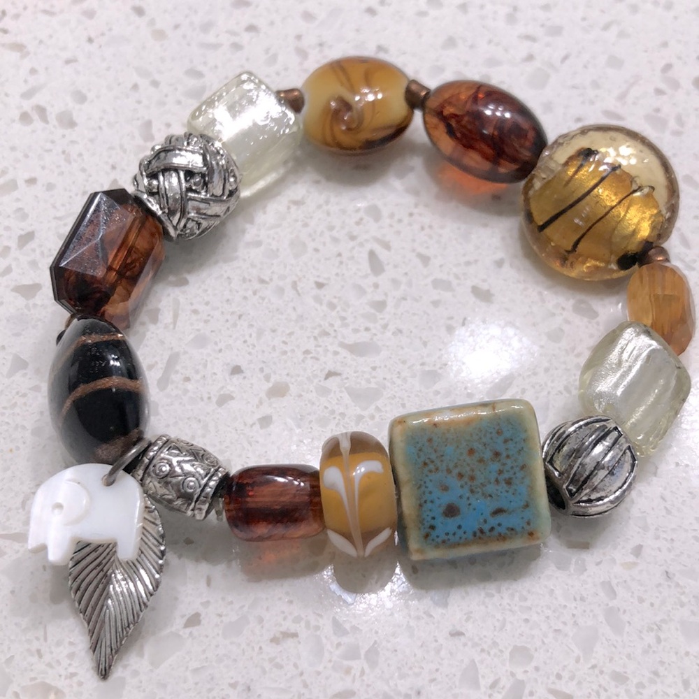AVON BEADED CHIC BRACELET GLASS/STONE/ELEPHANT/LEAF